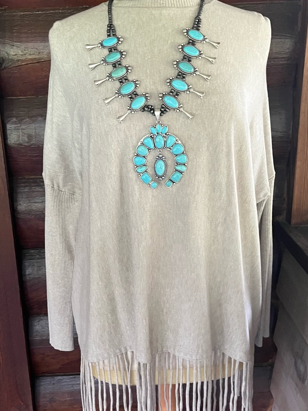 Turtleneck sweater with fringe bottom, super soft, bat sleeves, neutral color